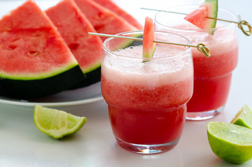 Watermelon smoothie  with lemon and mint to cool down on hot days. Refreshening fruit drink  for hot summer days.