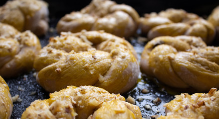 Homemade tasty buns with nut sprinkle.Pastry with homemade pastries. Baking homemade cookies and muffins with nuts. 