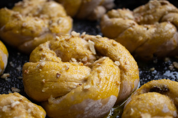 Homemade tasty buns with nut sprinkle.Pastry with homemade pastries. Baking homemade cookies and muffins with nuts. 