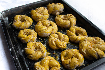 Homemade tasty buns with nut sprinkle.Pastry with homemade pastries. Baking homemade cookies and muffins with nuts. 