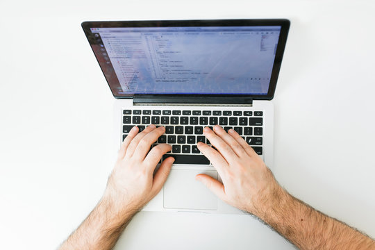 Closeup coding on screen, man hands coding html and programming on screen laptop, development web, developer