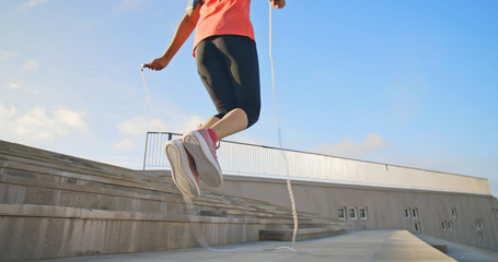 Fototapeta na wymiar woman sport and rope skipping