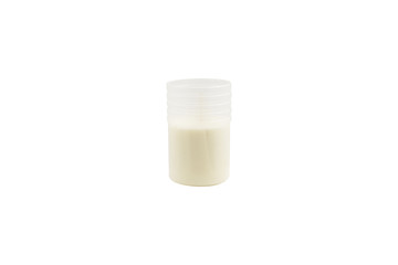 White candle in white plastic cup isolated on white