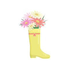 Beautiful colorful flowers composition bouquet in yellow rainboot over white