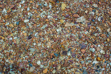Sea pebbles. Small stones gravel texture background.Pile of pebbles, thailand.Color stone in background.