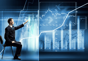 Businessman using media interface