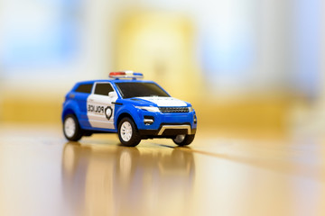 Toy police car - blurred background