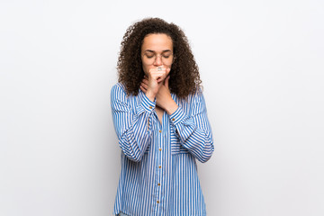 Dominican woman with striped shirt is suffering with cough and feeling bad