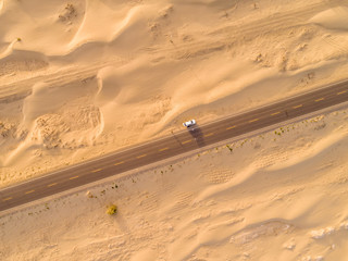 aerial view of highway on the gobi desert xinjiang， 