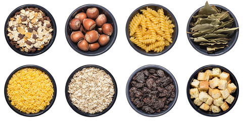 Collection of different spices, nuts, beans etc. isolated on white background