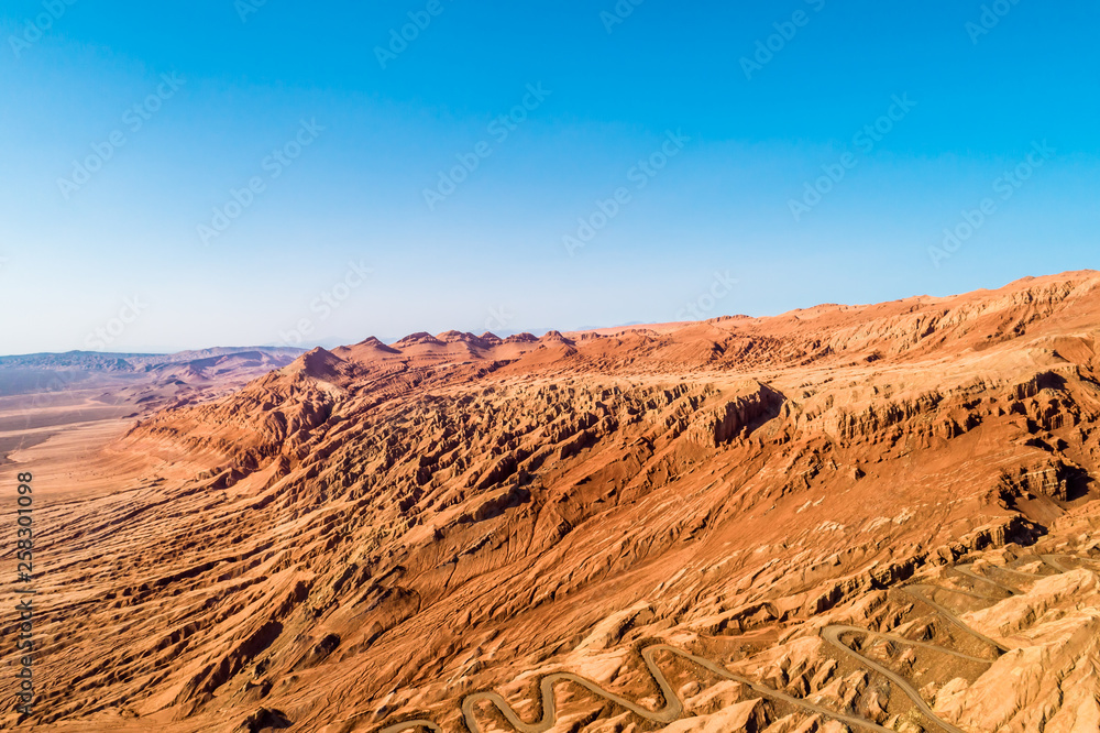 Poster The Flaming Mountains are barren eroded red sandstone hills in Tian Shan Mountain range Xinjiang China. 