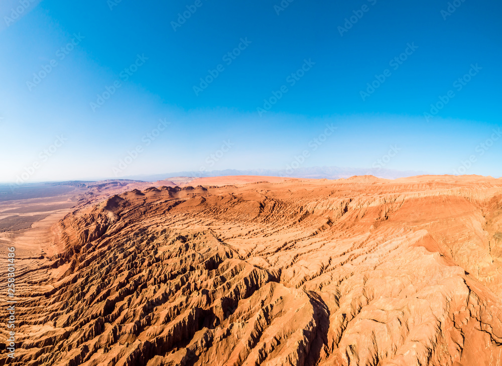 Poster The Flaming Mountains are barren eroded red sandstone hills in Tian Shan Mountain range Xinjiang China. 