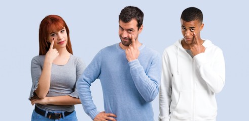 Obraz premium Group of three friends standing and looking to the front