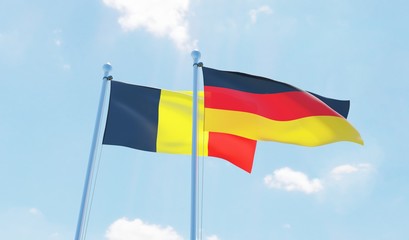Germany and Belgium, two flags waving against blue sky. 3d image