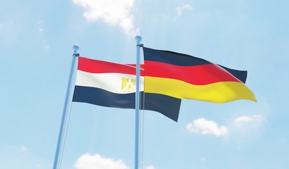Germany and Egypt, two flags waving against blue sky. 3d image