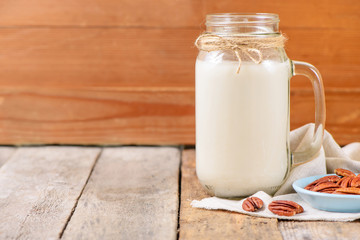 Vegan non dairy pecan  milk  in a jar with copy space