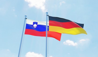 Germany and Slovenia, two flags waving against blue sky. 3d image