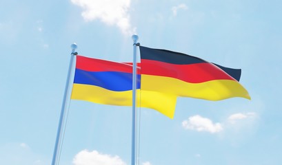 Germany and Armenia, two flags waving against blue sky. 3d image