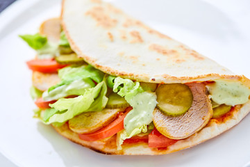 sandwich wrap with meat and vegetables