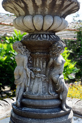Fototapeta premium Vintage Outdoor Fountain with Little Angels Decorated in the City Park