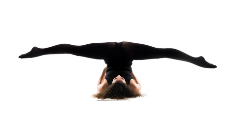 Girl ballet dancer on isolated white background