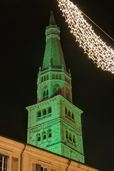 Modena, Emilia Romagna, Italy, Ghirlandina tower with green lights, Unesco world heritage sit