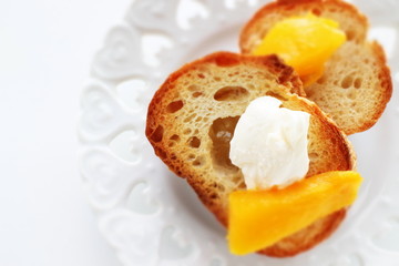 Mango and mascarpone cheese toast on dish