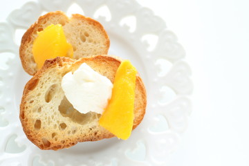Mango and mascarpone cheese toast on dish