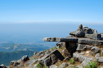 Fototapeta na wymiar Landscape stone rock on top hill mountain