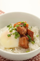 Japanese food, canned Yakitori and egg on rice