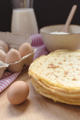 crepes preparation concept with ingredients on tabletop