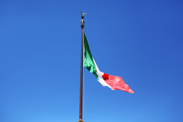 flag of Italy on a blue sky background. symbol of italy