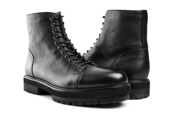 Men's fashion leather shoes for autumn, spring, European winter. Boots for a modern grunge woman. Women's black boots with laces isolated on white. Black Leather Army Boots. Autumn. Fashion. Style.