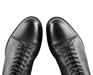 Men's fashion leather shoes for autumn, spring, European winter. Boots for a modern grunge woman. Women's black boots with laces isolated on white. Black Leather Army Boots. Autumn. Fashion. Style.