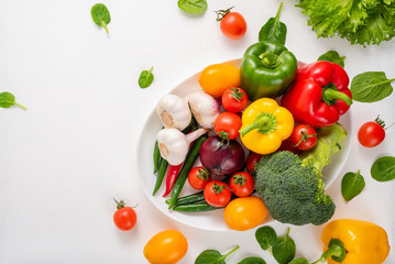 Whole vegetables on a white background.