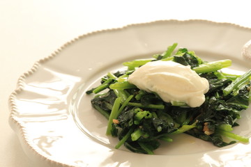 Spinach sauteed served with mascarpone cheese