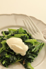 Spinach sauteed served with mascarpone cheese