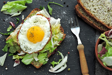 Fried toast with egg and salad. Healthy breakfast or snack. Keto diet. Keto snack or breakfast.