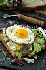 Fried toast with egg and salad. Healthy breakfast or snack. Keto diet. Keto snack or breakfast.