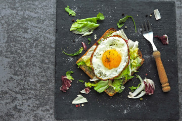 Fried toast with egg and salad. Healthy breakfast or snack. Keto diet. Keto snack or breakfast.