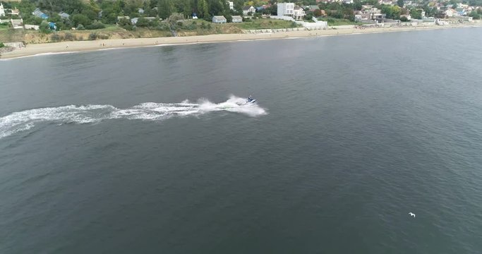 relaxing on the beach, riding a water bike