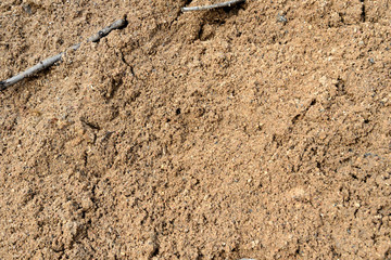 Large pile of construction sand close up as texture and background