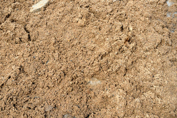 Large pile of construction sand close up as texture and background