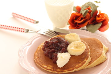 Red bean paste and banana pancake for sweet breakfast image