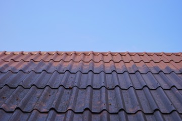 red tile roof and blue sky