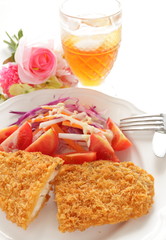 deppr fried fish served with tomato salad for Japanese food image