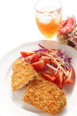 deppr fried fish served with tomato salad for Japanese food image