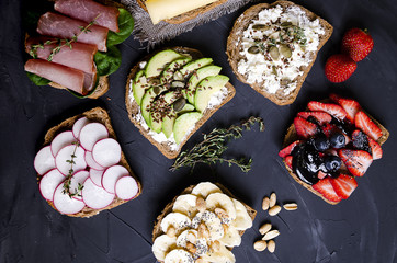 sandwiches with various fillings: ham, cheese, avocado, sauce