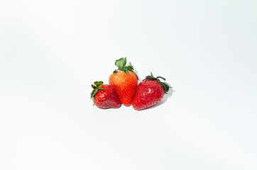  fresh strawberries. white background. crop 2019. one or several