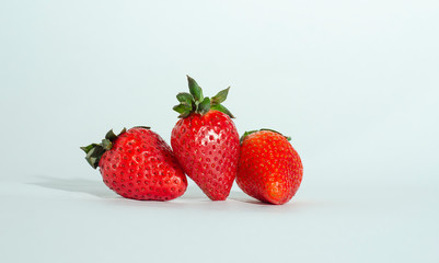  fresh strawberries. white background. crop 2019. one or several